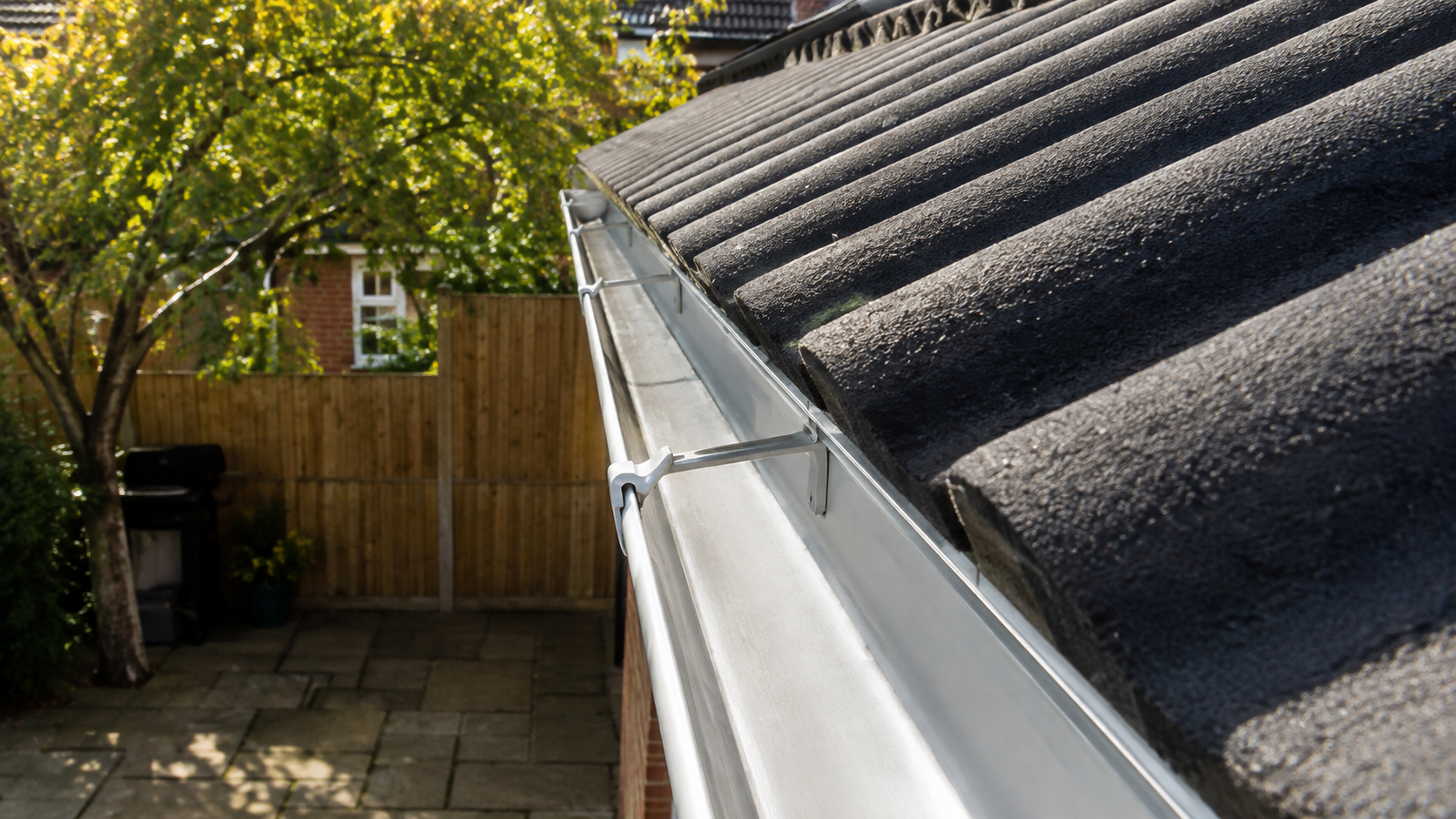 Gutter fully cleared after professional cleaning — showing the result of wind-aware, elevation-targeted gutter maintenance